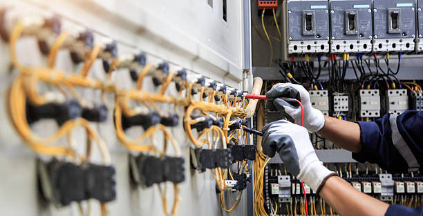 Professional Outlet Repair technician working in Travis County County, TX